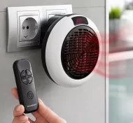Ventilator de aer cald din ceramică în priză cu telecomandă - 600 W - InnovaGoods